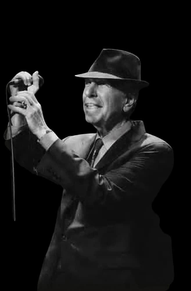Leonard Cohen in his signature fedora, singing at a microphone